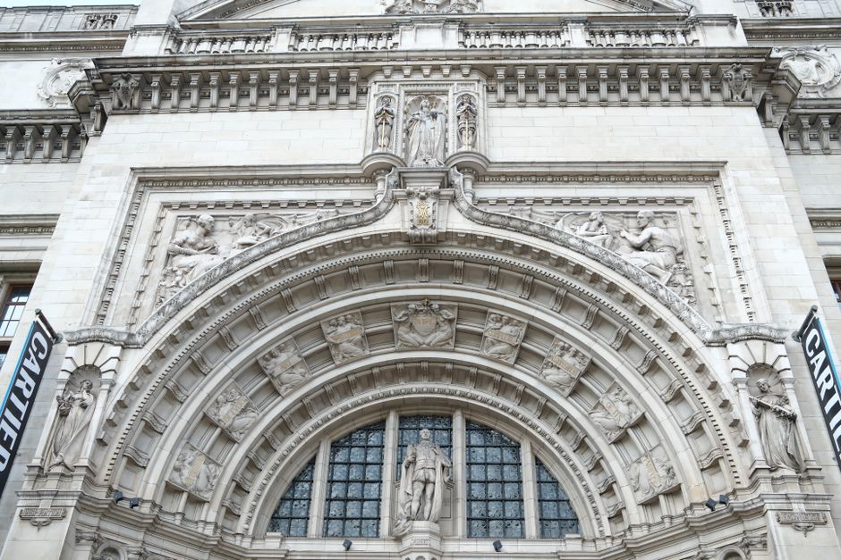 Close-up view of an ornate architectural arch adorned with intricate sculptures and relief