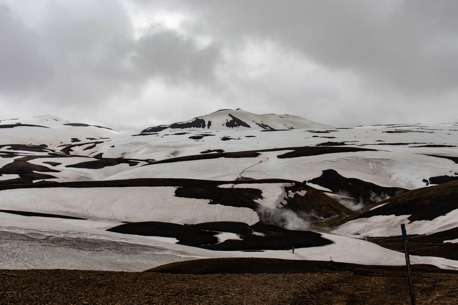 A stunning view of Iceland's snow-covered highlands showcasing rugged volcanic terrain.